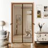 Decorative screen door in a stylish interior setting with furniture and decor.