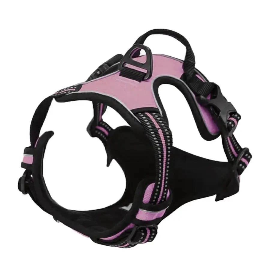Pink and black dog harness on a white background