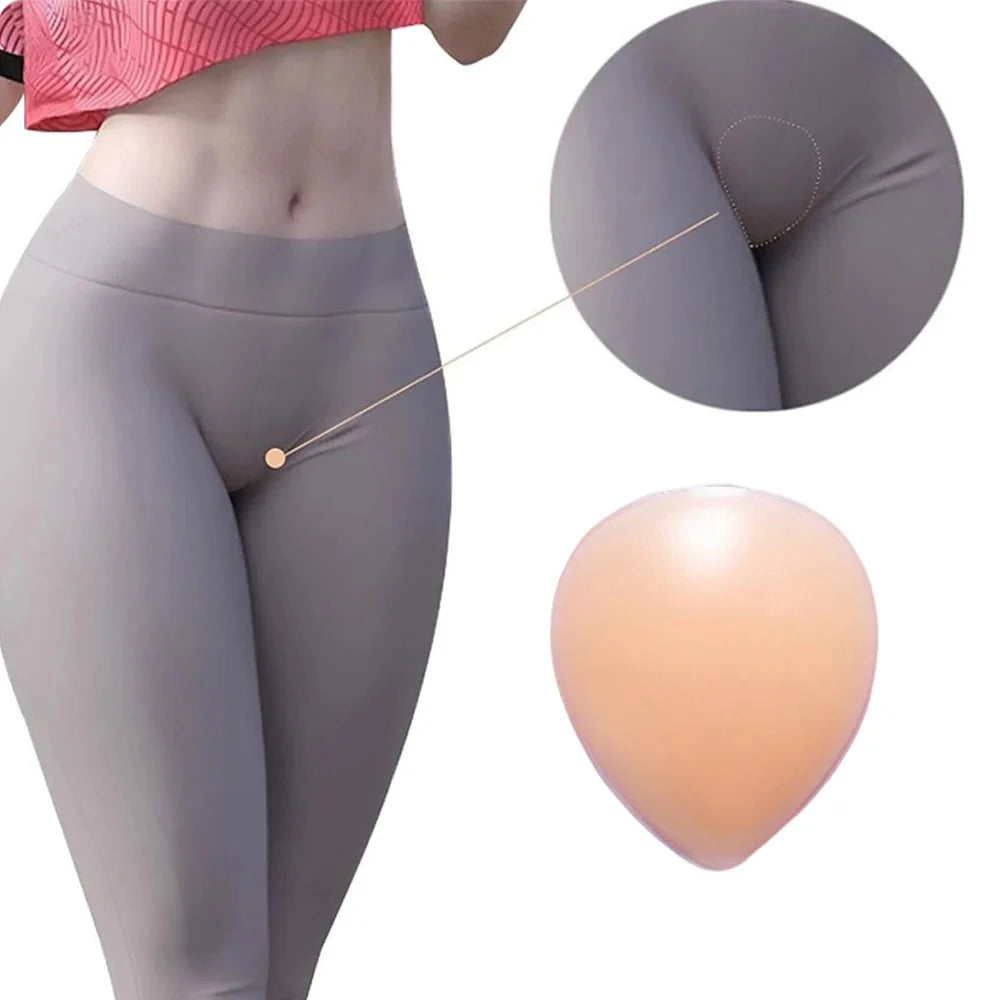 Gray leggings with a close-up of a beige pad on a white background