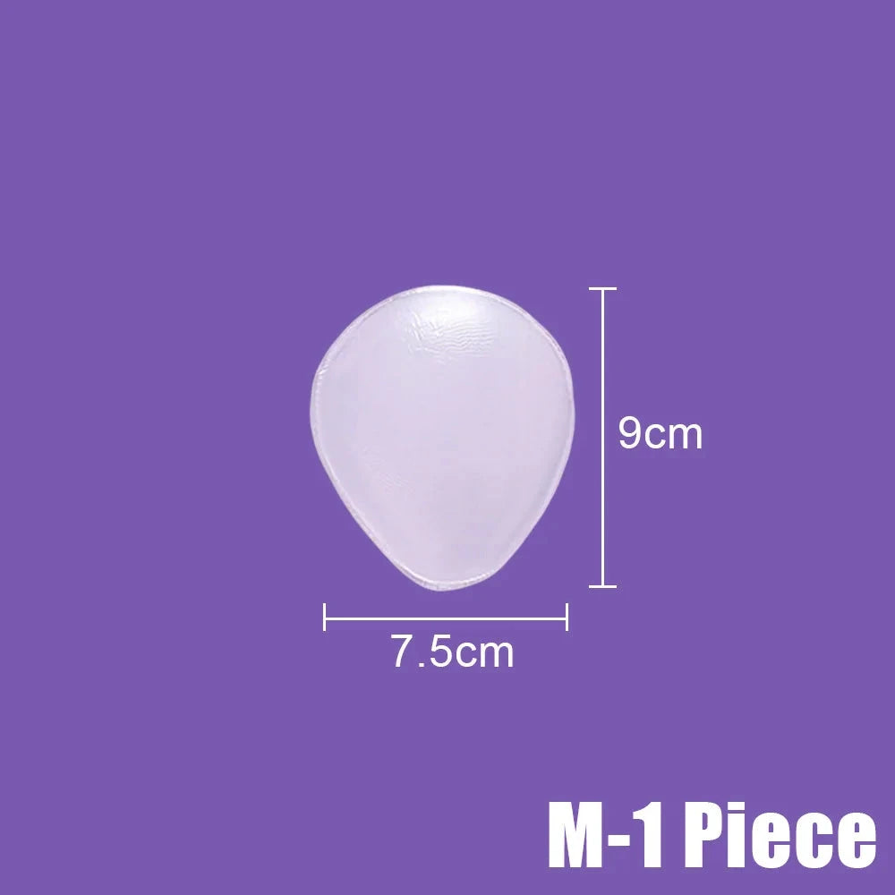 A translucent white teardrop-shaped adhesive pad shown on a solid purple background with white dimension lines indicating 7.5cm width and 9cm height, plus the text 'M-1 Piece' in the bottom right corner.