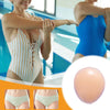 Woman in a striped swimsuit with inset of skin tone swatch.