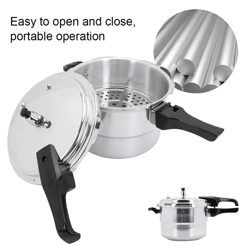 Stainless steel pressure cooker with open lid on a white background