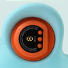Massage pillow with control panel on a light blue background