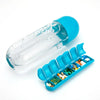 Blue pill organizer with transparent lid on a white background
