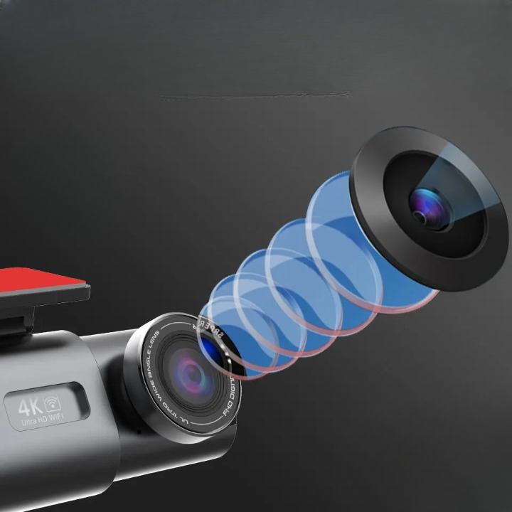 A close-up of a black camera lens module with a transparent blue multi-lens optical effect shown extending from it, set against a dark gray background. The main lens has '4K Ultra HD' text visible on the side.