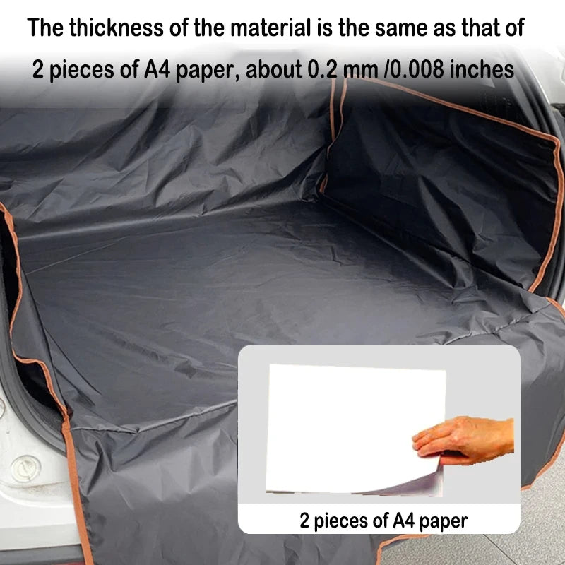 Car trunk with a black cover, showing the thickness comparison to two pieces of A4 paper.